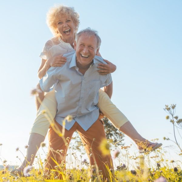 Low-angle,View,Portrait,Of,A,Happy,Senior,Man,Laughing,While